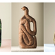 Illustration for article titled Photographs Of Meat Stuffed In Plastic Bottles Evoke Fleshy Horrors